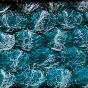 Teal fabric texture with interwoven white wisps, displaying a dense, organic pattern and indistinct facial shapes, labeled “egoitaliano puffo 803”.